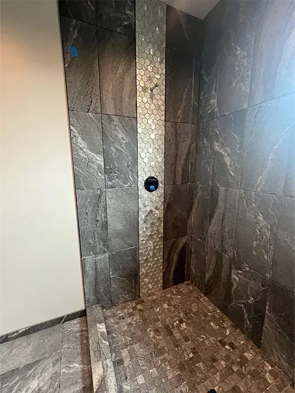 Bathroom project by Barron's Flooring & Home in Jackson, CA featuring Stone-look porcelain tile, Glass hexagon mosaic tile, Stone-look 2×2 mosaic porcelain tile