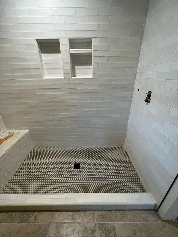 Bathroom project by Barron's Flooring & Home in Ione, CA featuring Subway tile, Penny round mosaic tile