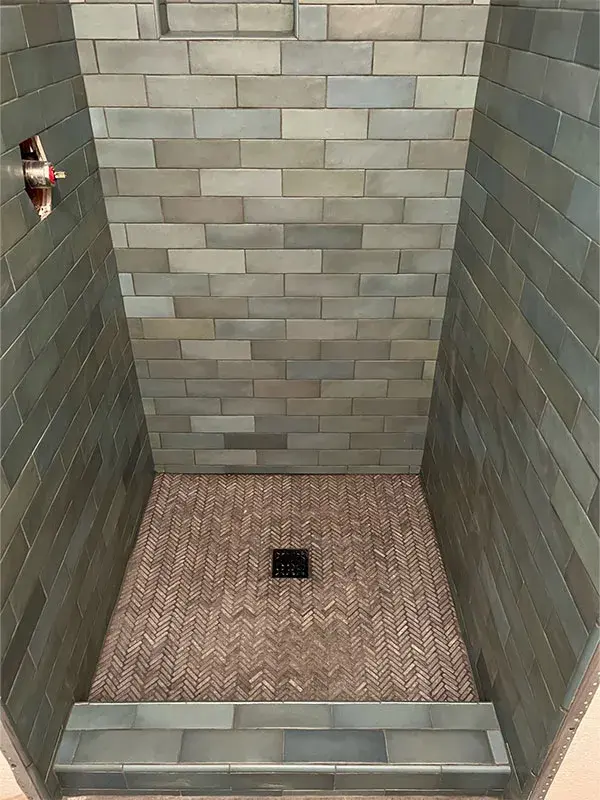 Bathroom project by Barron's Flooring & Home in Ione, CA featuring Subway tile, Glass mosaic chevron tile