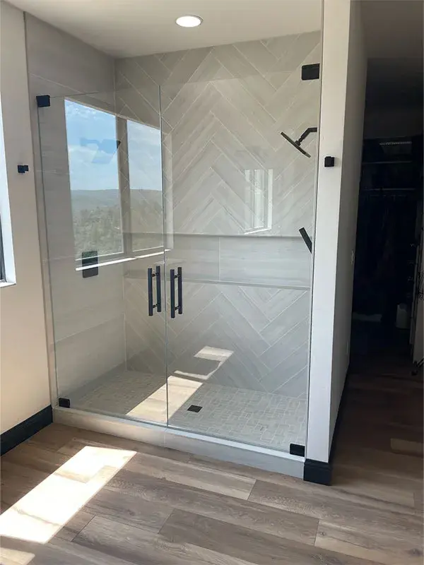 Bathroom project by Barron's Flooring & Home in Sutter Creek, CA featuring Chevron pattern tile, Basketweave mosaic porcelain tile, Laminate