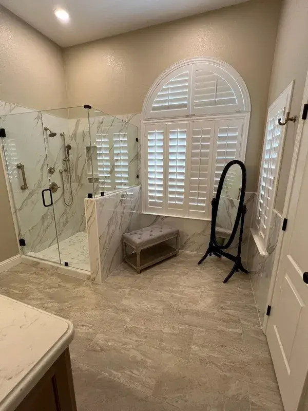 Bathroom project by Barron's Flooring & Home in Loomis, CA featuring Happy Floors Dorian polished 24×48 tile, Happy Floors Dorian polished 2×2 tile, Emser Milestone Dust 12×24 tile