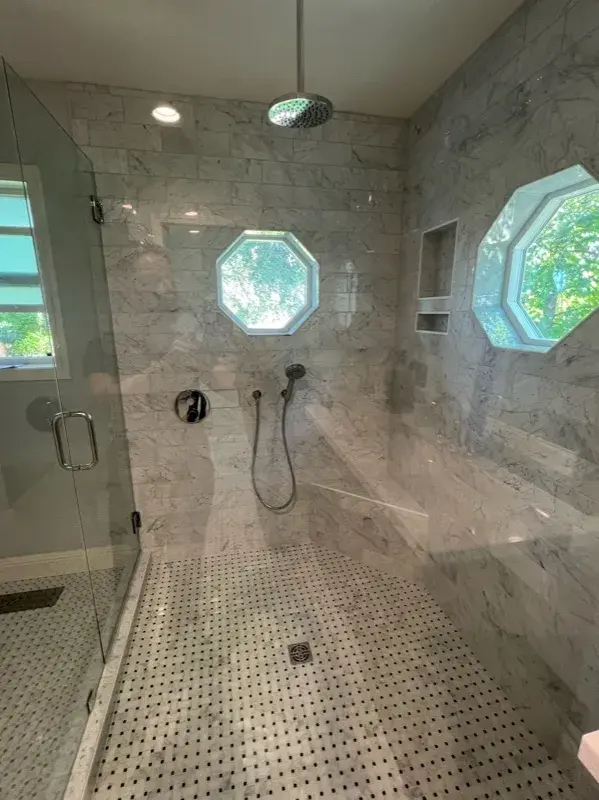 Bathroom project by Barron's Flooring & Home in Valley Springs, CA featuring Carrara polished marble subway tile, Bianco Carrara/Nero dot polished mosaic, Bianco Carrara/Nero dot polished mosaic