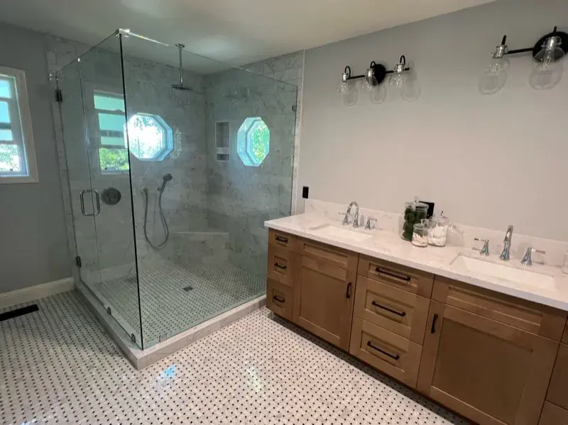 Bathroom project by Barron's Flooring & Home in Valley Springs, CA featuring Carrara polished marble subway tile, Bianco Carrara/Nero dot polished mosaic, Bianco Carrara/Nero dot polished mosaic