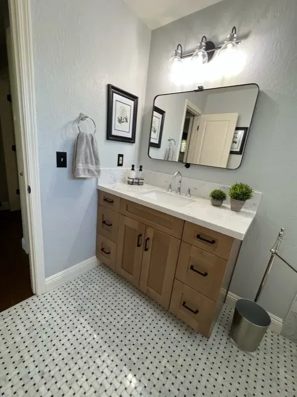 Bathroom project by Barron's Flooring & Home in Valley Springs, CA featuring Carrara polished marble subway tile, Bianco Carrara/Nero dot polished mosaic, Bianco Carrara/Nero dot polished mosaic