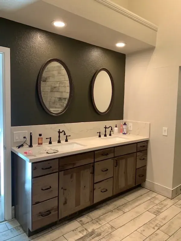 Bathroom project by Barron's Flooring & Home in Placerville, CA featuring Surface Art Oxidized Plank tile, Weathered Light, Maniscalco Botany Bay sliced pebble, Shadow Blend, Surface Art Oxidized Plank tile, Weathered Light