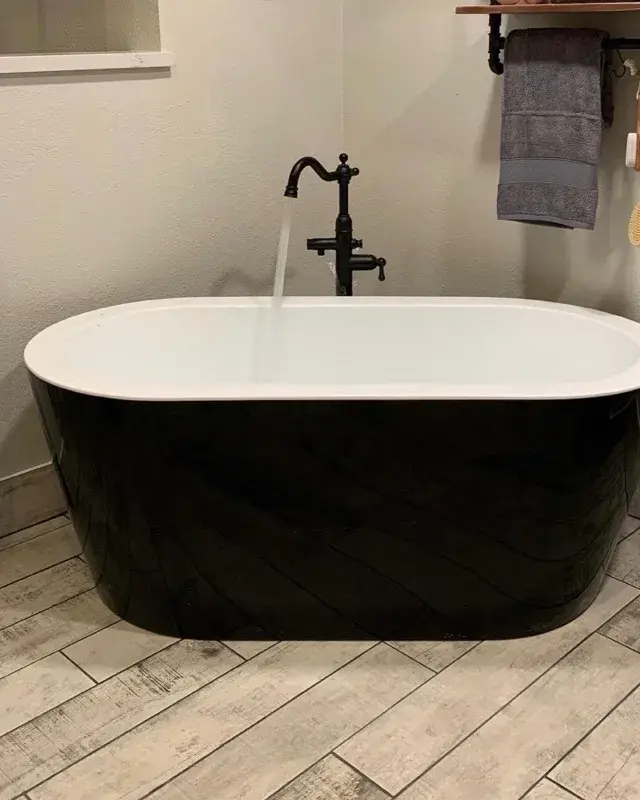 Bathroom project by Barron's Flooring & Home in Placerville, CA featuring Surface Art Oxidized Plank tile, Weathered Light, Maniscalco Botany Bay sliced pebble, Shadow Blend, Surface Art Oxidized Plank tile, Weathered Light