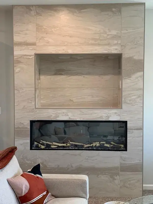 Fireplace project by Barron's Flooring & Home in the California foothills featuring 12×24 porcelain tile