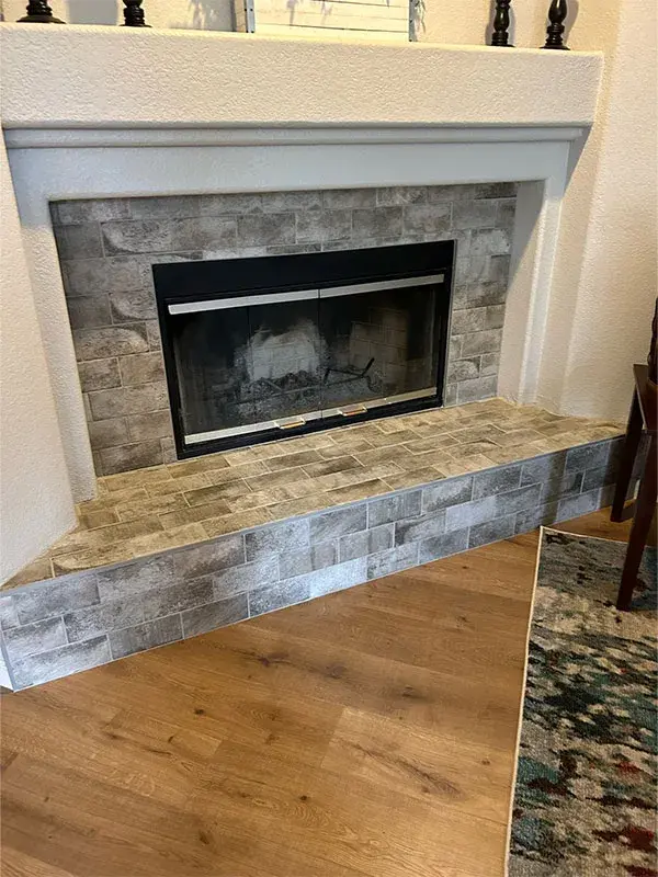 Fireplace project by Barron's Flooring & Home in the California foothills featuring Subway tile