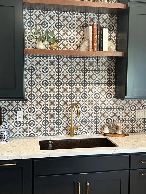 Kitchen project by Barron's Flooring & Home in Sutter Creek, CA featuring Canyon Creek Maple painted cabinets with floating shelves, Cambria Quartz countertop, Hand-painted marble tile
