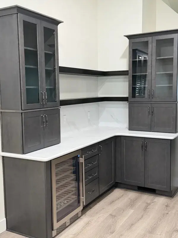 Kitchen project by Barron's Flooring & Home in Ione, CA featuring Kemper Maple cabinets, Marimac door, Colt stain, MSI Calacatta Ocellio 2cm quartz, MSI Calacatta Izaro 2cm quartz