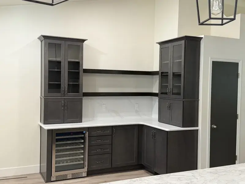Kitchen project by Barron's Flooring & Home in Ione, CA featuring Kemper Maple cabinets, Marimac door, Colt stain, MSI Calacatta Ocellio 2cm quartz, MSI Calacatta Izaro 2cm quartz