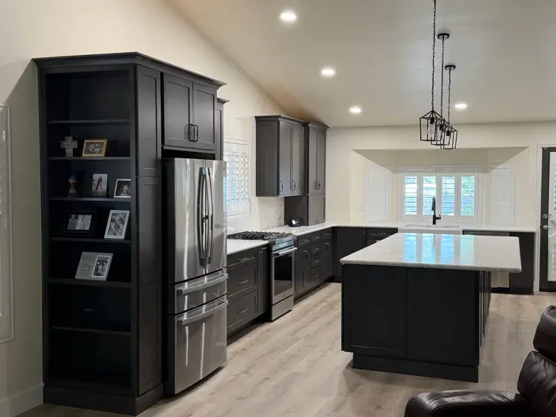 Kitchen project by Barron's Flooring & Home in Ione, CA featuring Kemper Maple cabinets, Marimac door, Colt stain, MSI Calacatta Ocellio 2cm quartz, MSI Calacatta Izaro 2cm quartz