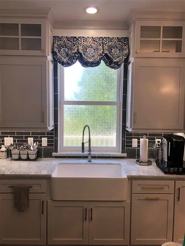 Kitchen project by Barron's Flooring & Home in Sutter Creek, CA featuring Canyon Creek Maple painted cabinets, Carrara marble countertop, Adex Tile backsplash