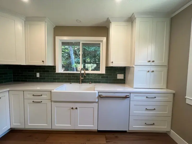 Kitchen project by Barron's Flooring & Home in Sutter Creek, CA featuring Kemper Maple cabinets painted White, Kemper Maple cabinets painted Retreat, Silestone Ethereal Glow 2cm quartz