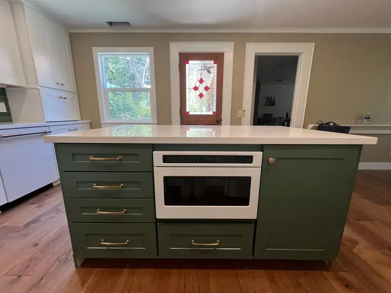 Kitchen project by Barron's Flooring & Home in Sutter Creek, CA featuring Kemper Maple cabinets painted White, Kemper Maple cabinets painted Retreat, Silestone Ethereal Glow 2cm quartz