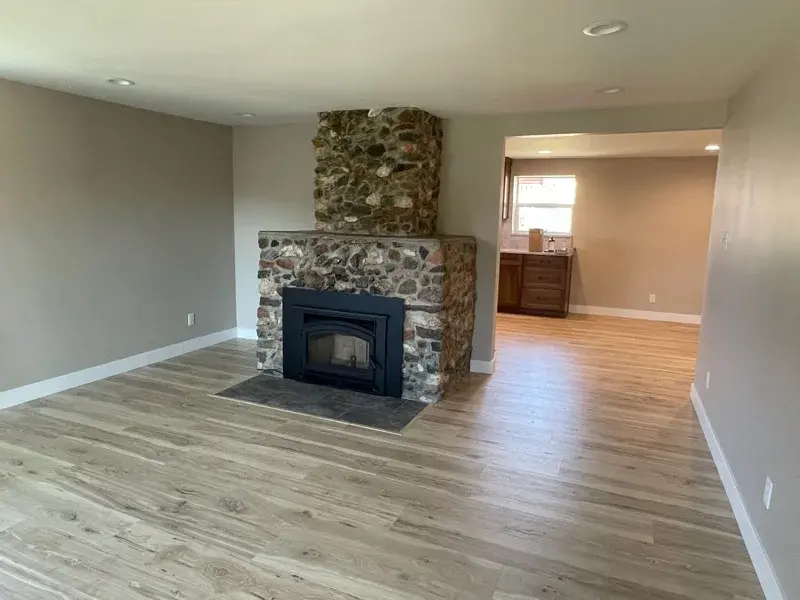 Kitchen project by Barron's Flooring & Home in Plymouth, CA featuring Kemper Rustic hickory cabinets, Marimac door, Kanga stain, Sensa Dakar 2cm quartzite, MSI Renzo square tile, Dove