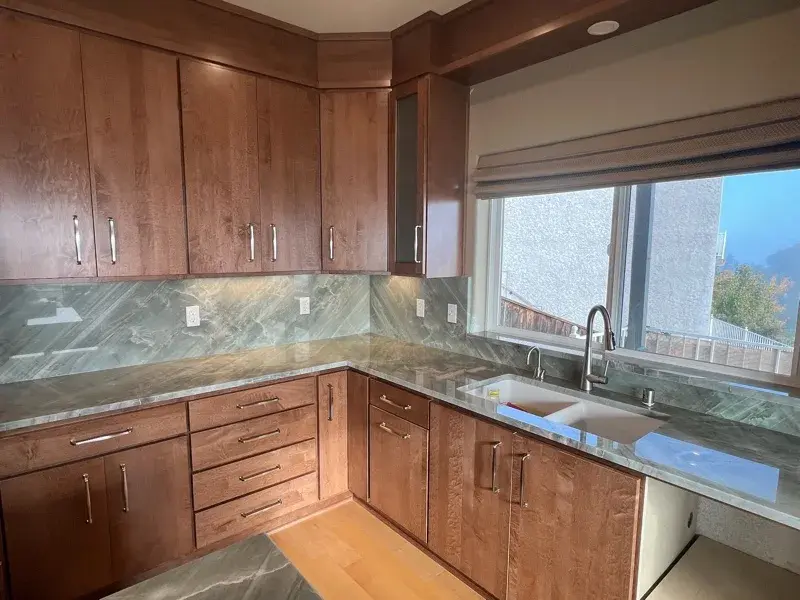 Kitchen project by Barron's Flooring & Home in Jackson, CA featuring Canyon Creek Maple cabinets, Copenhagen door, Chickory stain, Cosentino Itara 3cm quartzite, White quartz composite 33" double-basin sink