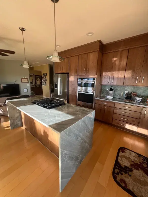 Kitchen project by Barron's Flooring & Home in Jackson, CA featuring Canyon Creek Maple cabinets, Copenhagen door, Chickory stain, Cosentino Itara 3cm quartzite, White quartz composite 33" double-basin sink