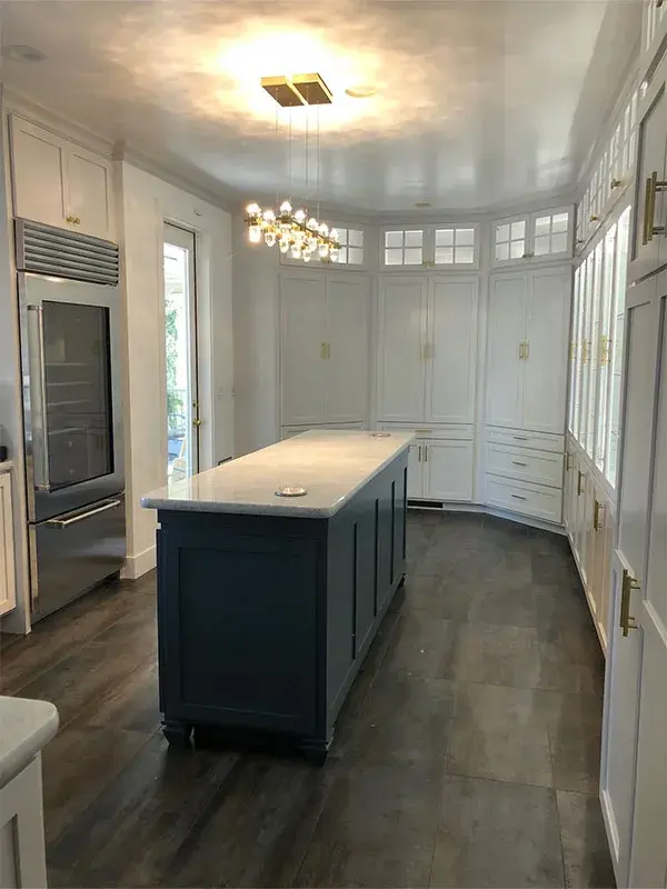Kitchen project by Barron's Flooring & Home in Sutter Creek, CA featuring Canyon Creek Maple painted cabinets, Carrara marble countertop, Surface Art 12×24 tile floor