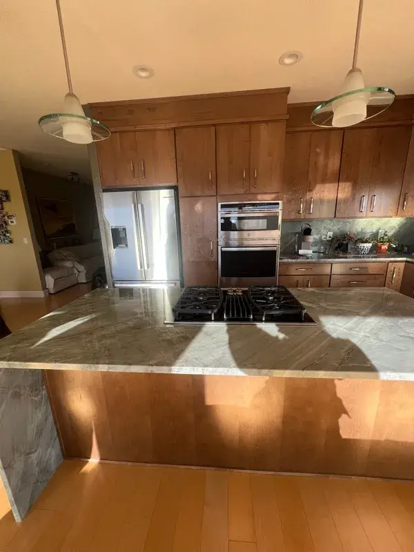 Kitchen project by Barron's Flooring & Home in Jackson, CA featuring Canyon Creek Maple cabinets, Copenhagen door, Chickory stain, Cosentino Itara 3cm quartzite, White quartz composite 33" double-basin sink