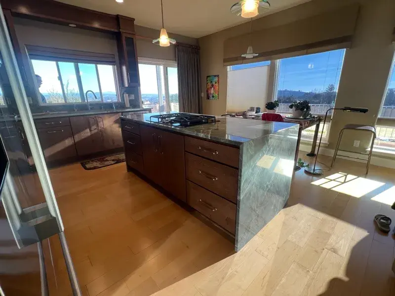 Kitchen project by Barron's Flooring & Home in Jackson, CA featuring Canyon Creek Maple cabinets, Copenhagen door, Chickory stain, Cosentino Itara 3cm quartzite, White quartz composite 33" double-basin sink
