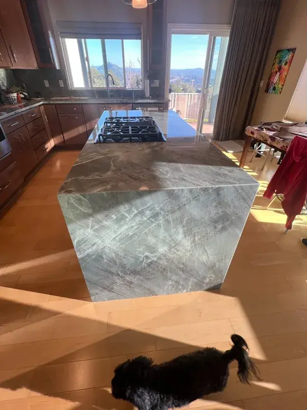 Kitchen project by Barron's Flooring & Home in Jackson, CA featuring Canyon Creek Maple cabinets, Copenhagen door, Chickory stain, Cosentino Itara 3cm quartzite, White quartz composite 33" double-basin sink