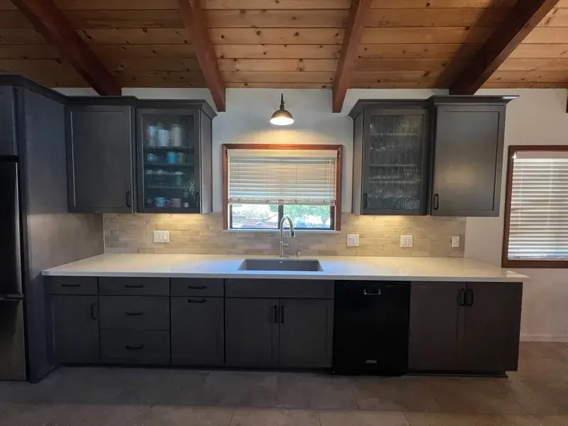 Kitchen project by Barron's Flooring & Home in Sutter Creek, CA featuring Kemper Maple cabinets, Marimac door, Colt stain, MSI Cashmere Taj 2cm quartz, Surface Art Parkside subway tile, beige, 2.5×8