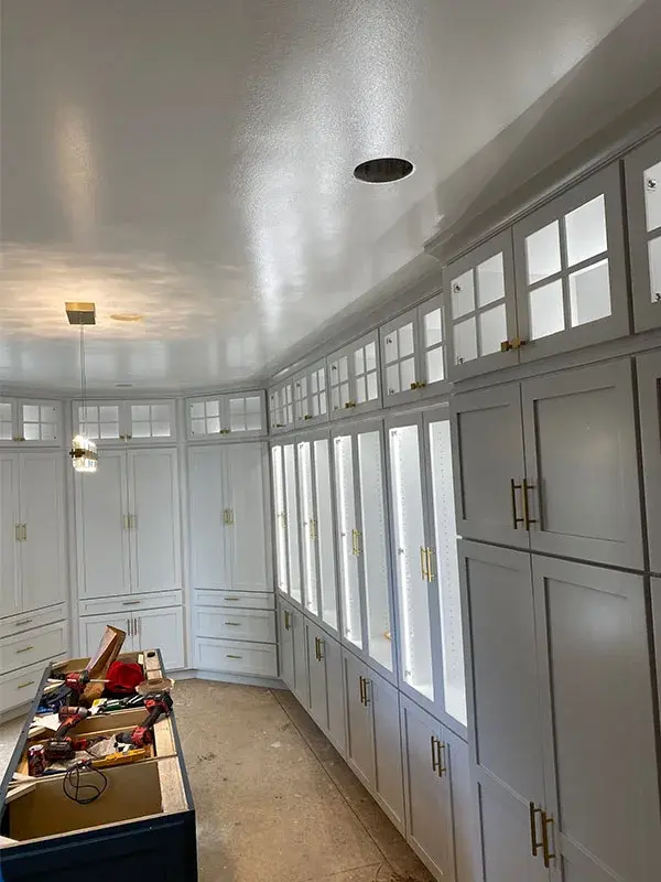 Kitchen project by Barron's Flooring & Home in Sutter Creek, CA featuring Canyon Creek Maple painted cabinets, Temperature-controlled LED interior cabinet lighting