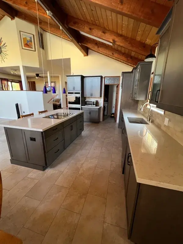 Kitchen project by Barron's Flooring & Home in Sutter Creek, CA featuring Kemper Maple cabinets, Marimac door, Colt stain, MSI Cashmere Taj 2cm quartz, Surface Art Parkside subway tile, beige, 2.5×8