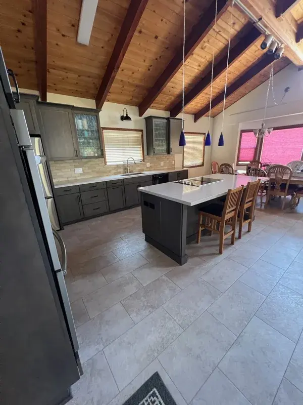 Kitchen project by Barron's Flooring & Home in Sutter Creek, CA featuring Kemper Maple cabinets, Marimac door, Colt stain, MSI Cashmere Taj 2cm quartz, Surface Art Parkside subway tile, beige, 2.5×8