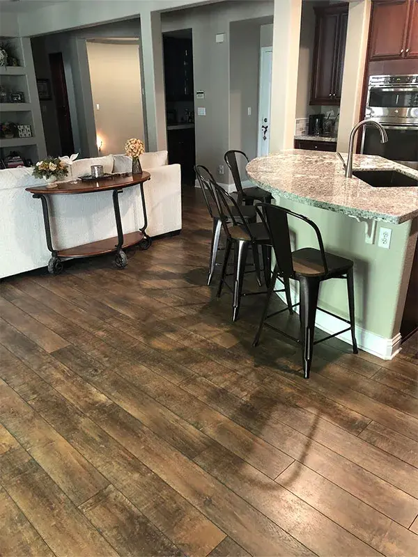 Kitchen project by Barron's Flooring & Home in El Dorado Hills, CA featuring Polished granite countertop, Mannington Restorations laminate