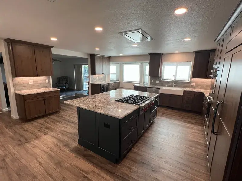 Kitchen project by Barron's Flooring & Home in Plymouth, CA featuring Kemper Rustic alder cabinets, Marric door, Morel stain, Kemper Maple cabinets, Marric door, painted Maritime, MSI Avalon White 2cm granite