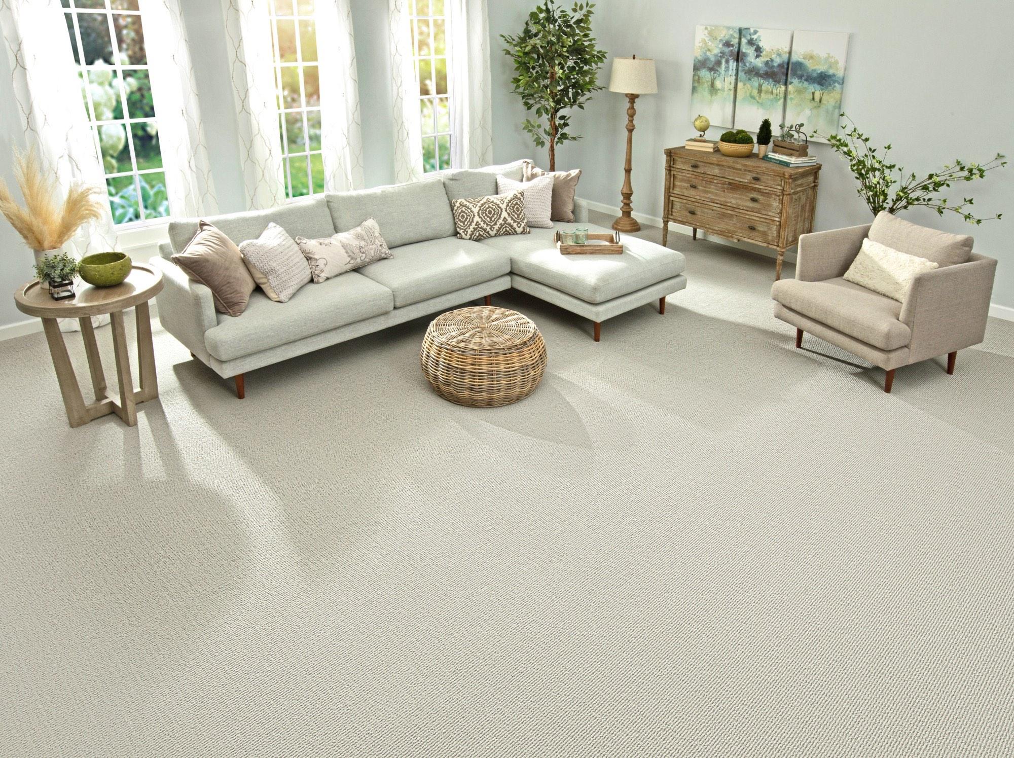 Mohawk EverStrand Berber loop carpet in a contemporary living room with sectional sofa