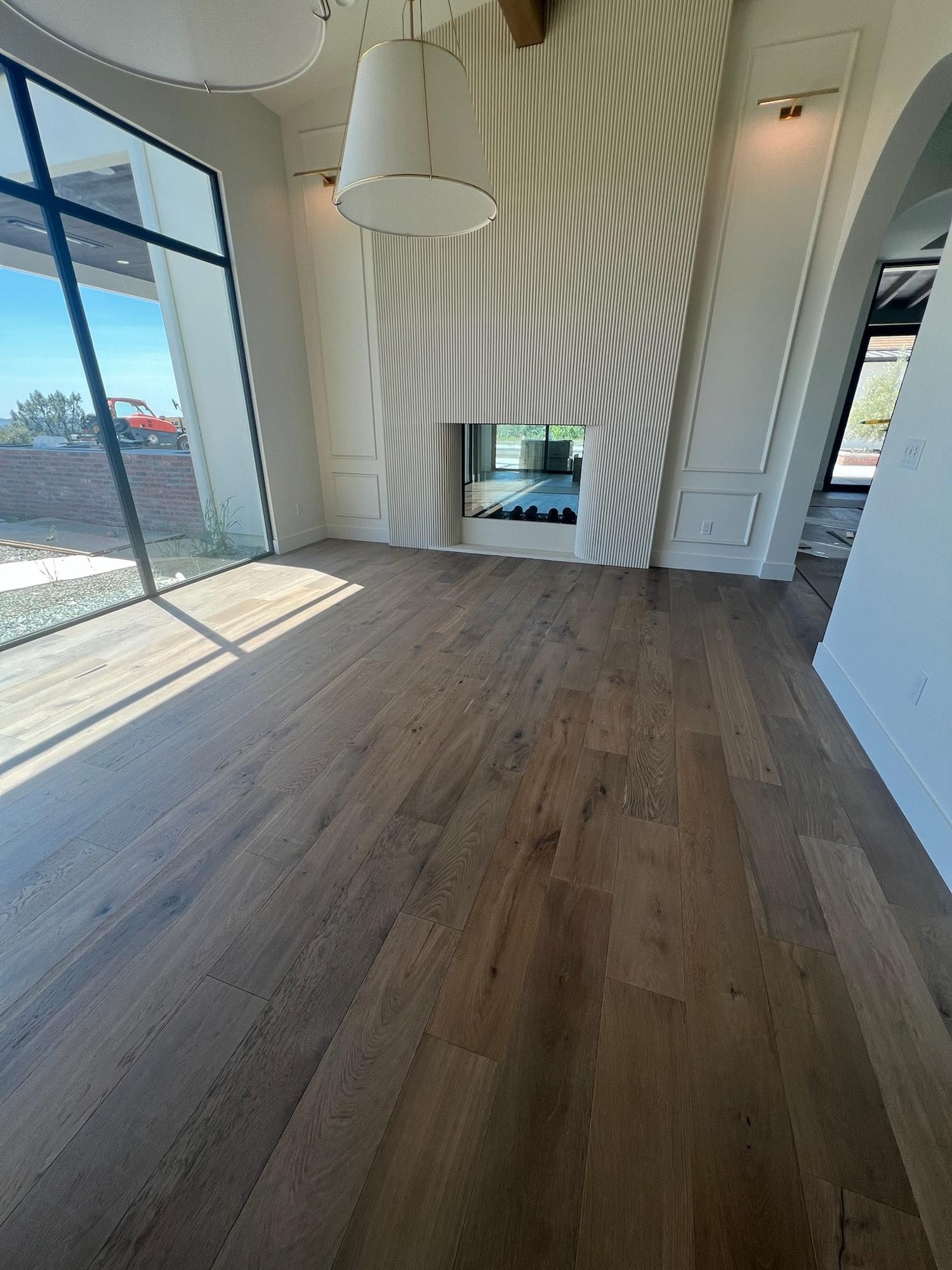 A great room with new hardwood flooring